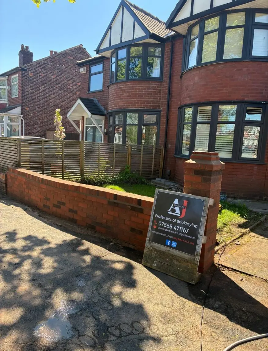 Completed red brick front wall with pier, built by AJ Brickwork in Manchester