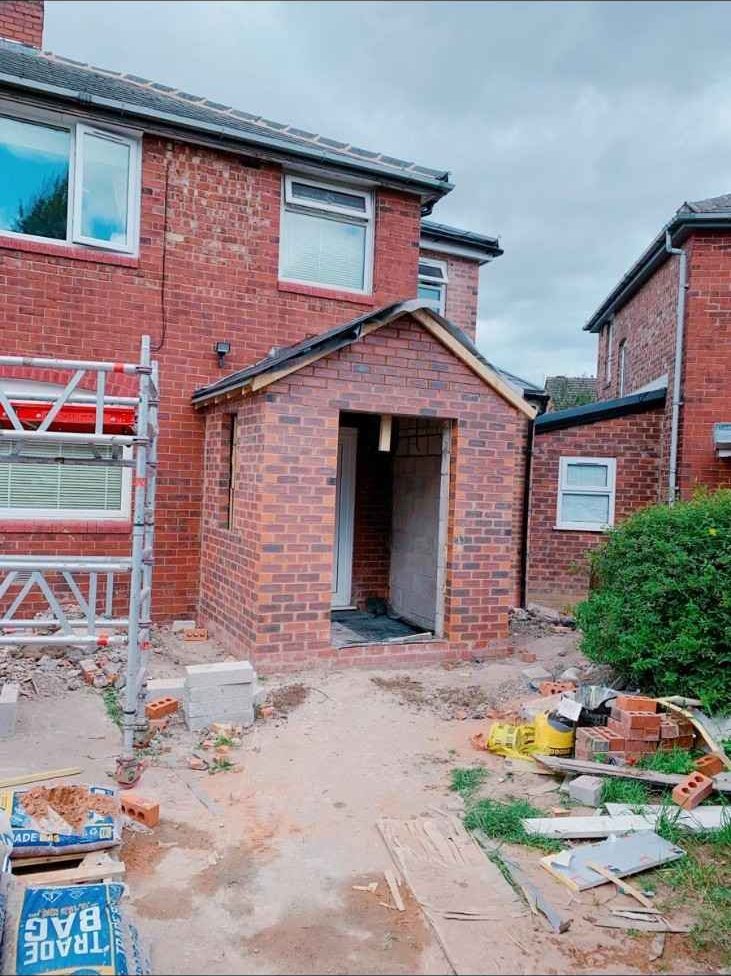 Red brick house extension built by AJ Brickwork in Manchester