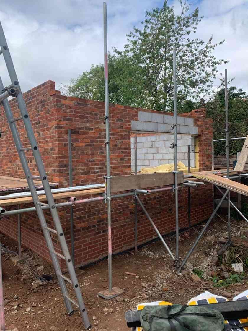 Brick and blockwork with scaffolding in place, by AJ Brickwork in Manchester
