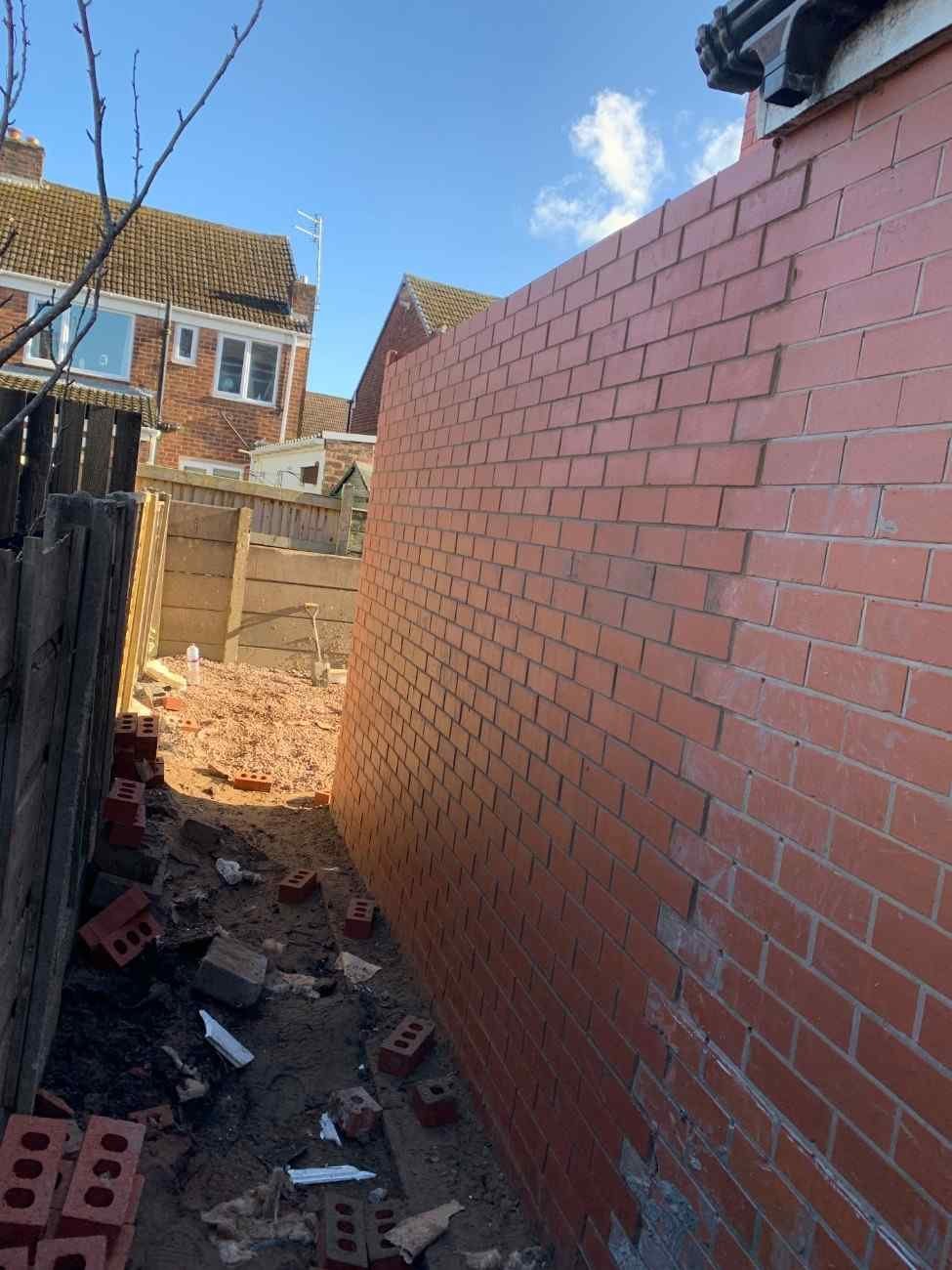 Full height brick wall built by AJ Brickwork in Manchester